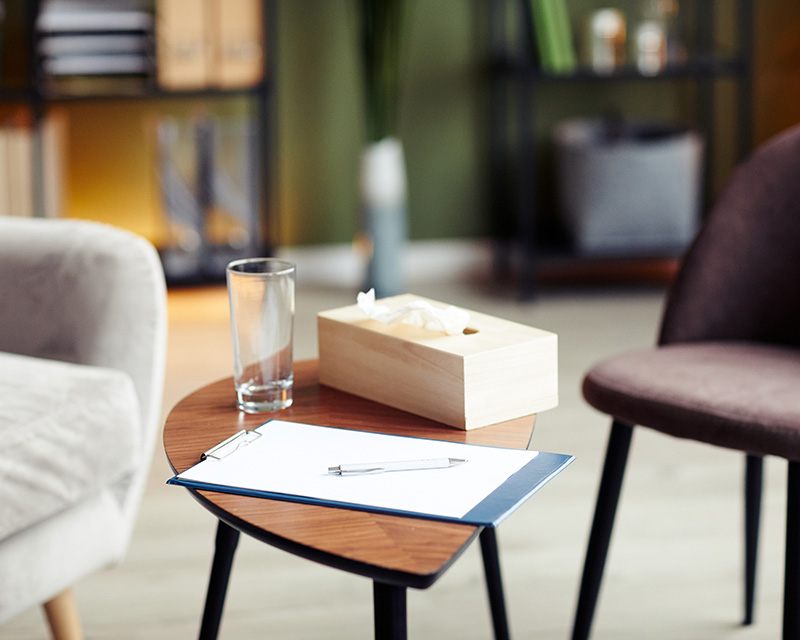 Therapy office with table with box of tissues on it