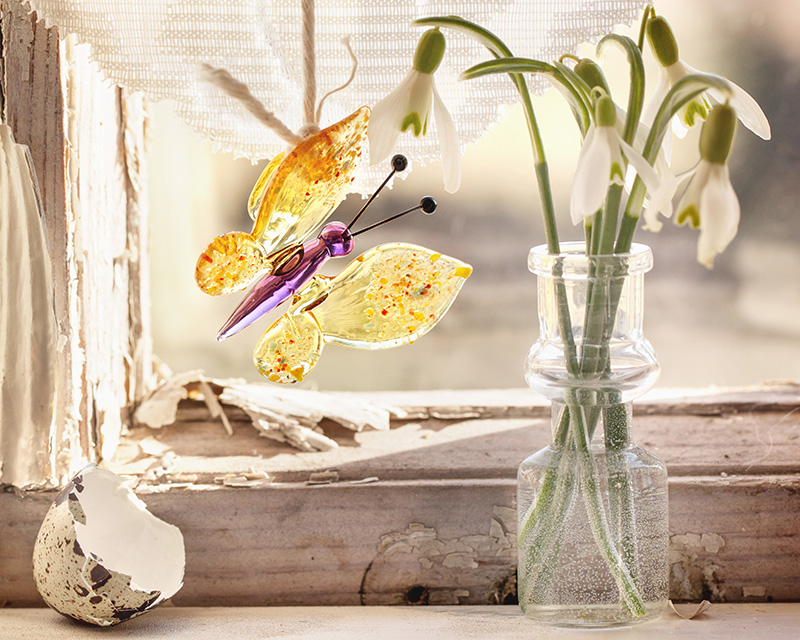 Glass butterfly representing life transitions